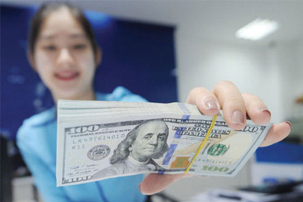 Ưu điểm của việc đổi từ đô la Mỹ sang tiền Việt khi du khách du lịch tại nước ta.